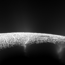 Cracks in the surface of Saturn's moon.  Water is erupting through the cracks into space from subterranean seas.